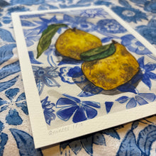 Load image into Gallery viewer, A5 print of two Quinces on a blue and white tablecloth