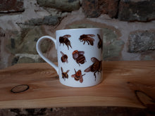 Load image into Gallery viewer, Bee mug by Alice Draws The Line. A china tea or coffee cup covered in bee illustrations
