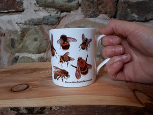 Bee mug by Alice Draws The Line. A china tea or coffee cup covered in bee illustrations