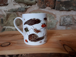 Bug Mug by Alice Draws The Line, a china cup covered in mini-beasts and creepy crawlies