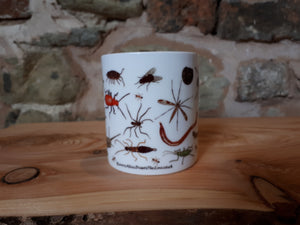 Bug Mug by Alice Draws The Line, a china cup covered in mini-beasts and creepy crawlies