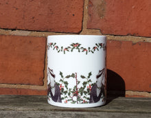 Load image into Gallery viewer, Christmas Badgers China Mug, Badgers with holly, ivy and mistletoe illustrations by Alice Draws The Line