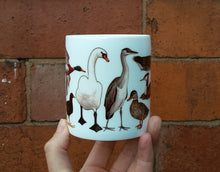 Load image into Gallery viewer, Ducks mug by Alice Draws the Line, a range of pond visitors on a China mug