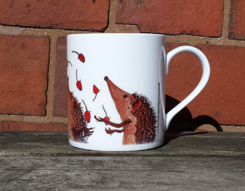 Hedgehogs Juggling Rosehips China Mug
