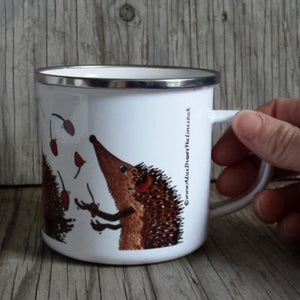 Hedgehog juggling rosehips mug by Alice Draws the Line