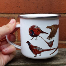 Load image into Gallery viewer, Pheasants enamel mug by Alice Draws The Line, cock pheasants and hen pheasant in different poses.