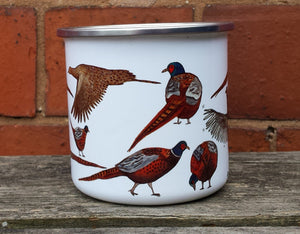 Pheasants enamel mug by Alice Draws The Line, cock pheasants and hen pheasant in different poses.