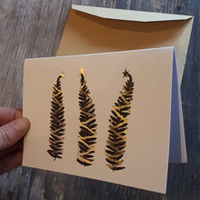 Load image into Gallery viewer, Three fern trees with gold foil detail Christmas Card by Alice Draws the Line, gold baubles and gold tinsel