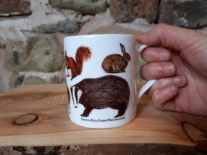 Woodland animals mug by Alice Draws The Line, Woodland fauna species including a hare, fox, badger and hedgehog