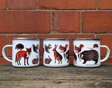 Load image into Gallery viewer, Woodland Animals enamel mug by Alice Draws The Line, forest gift, enamel mug with Badger, Fox, Hare, Red Squirrel, Grey Squirrel, Wood Mouse, Rabbit and Hedgehog illustrations